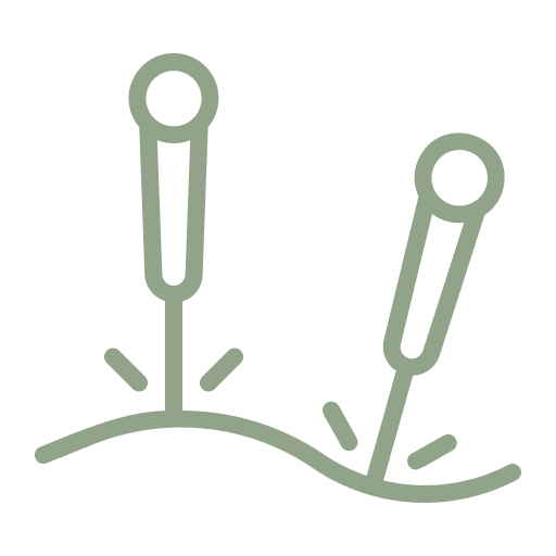 Stylized acupuncture needles icon on black